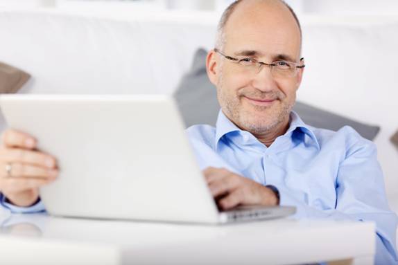 shutterstock white guy collared shirt laptop2